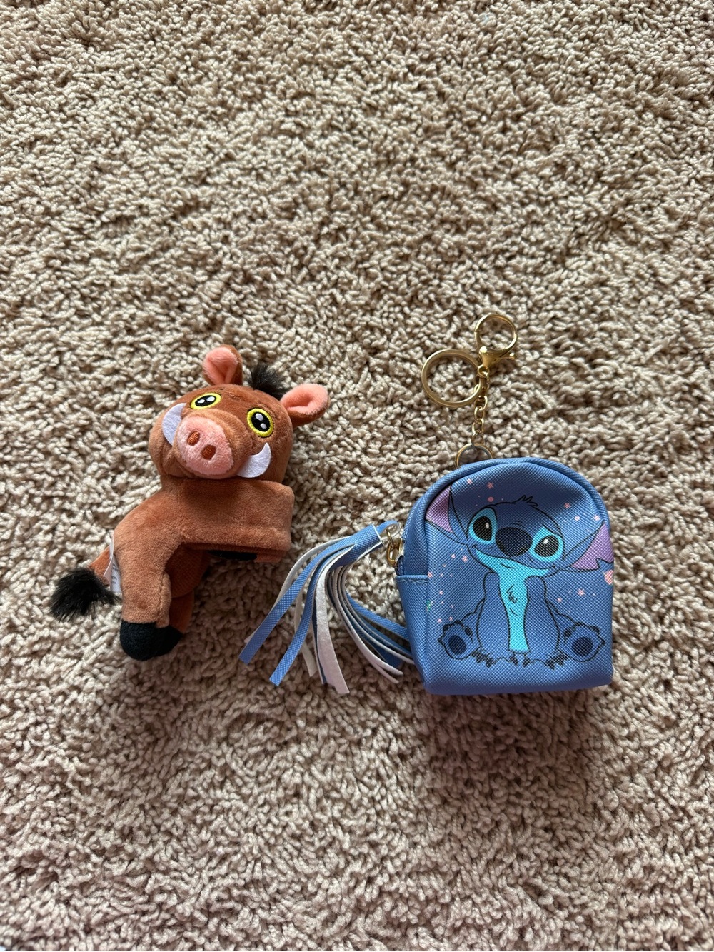 Blue Stitch Kids Keychain Coin Purse with Tassel and pumbaa slap bracelet.